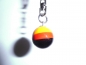 Preview: Key ring with black, red and yellow ball 16mm