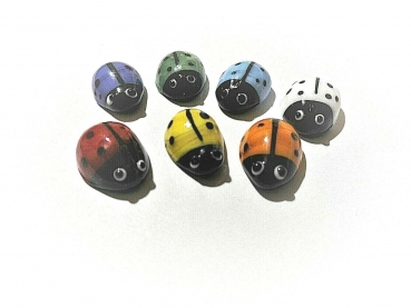 7 colorful glass ladybugs sorted