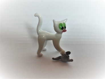 Cat catches mouse - white