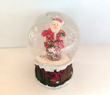 Santa Claus snow globe with sack