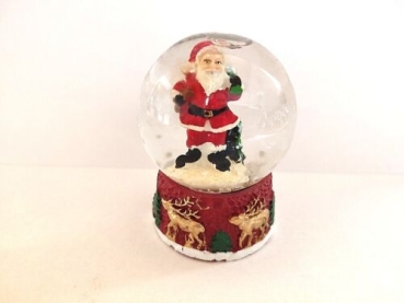 Santa Claus snow globe with sack