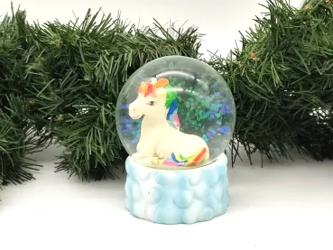 Glitter ball unicorn looks to the left