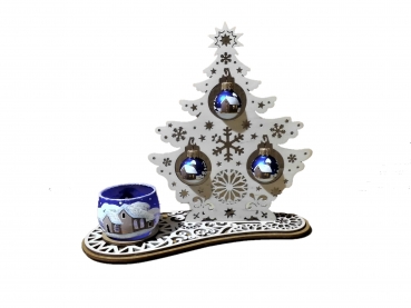 Christmas tree made of wood with a lantern and three blue glass balls