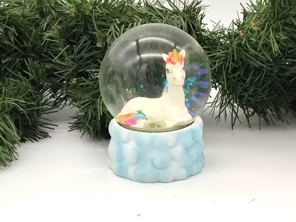Glitter ball unicorn looks to the right