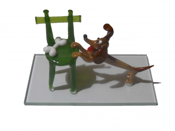 Dog with a bone on the chair